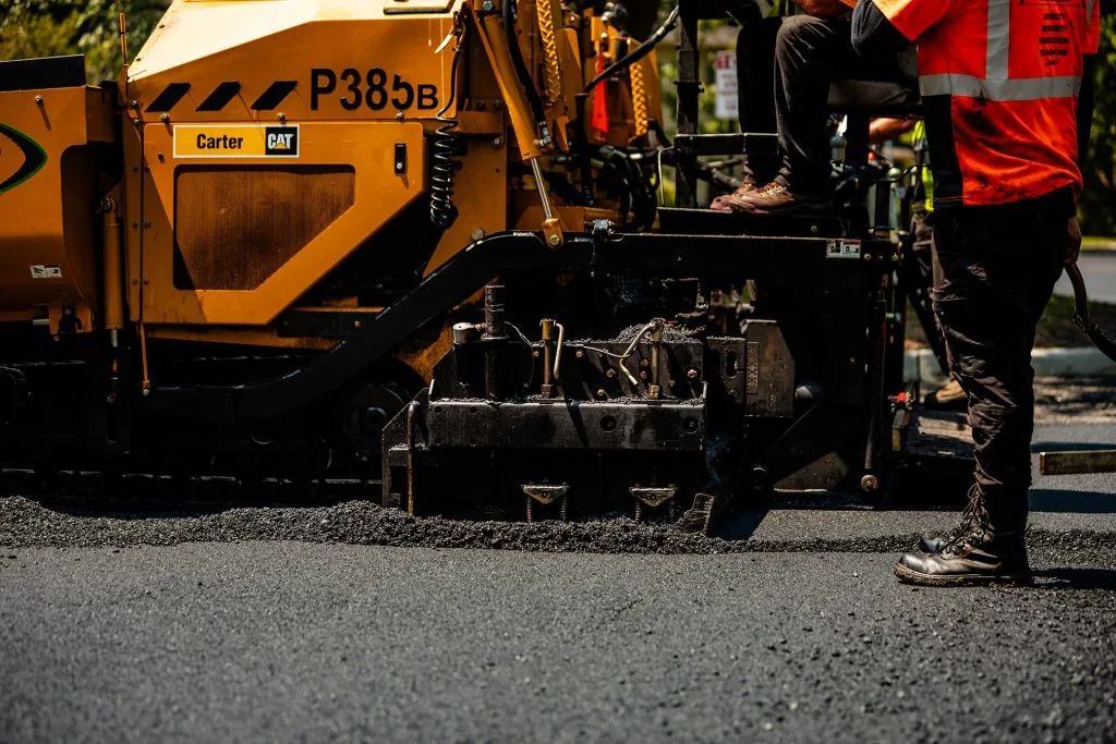 Lower view of CAT Machine asphalt paving