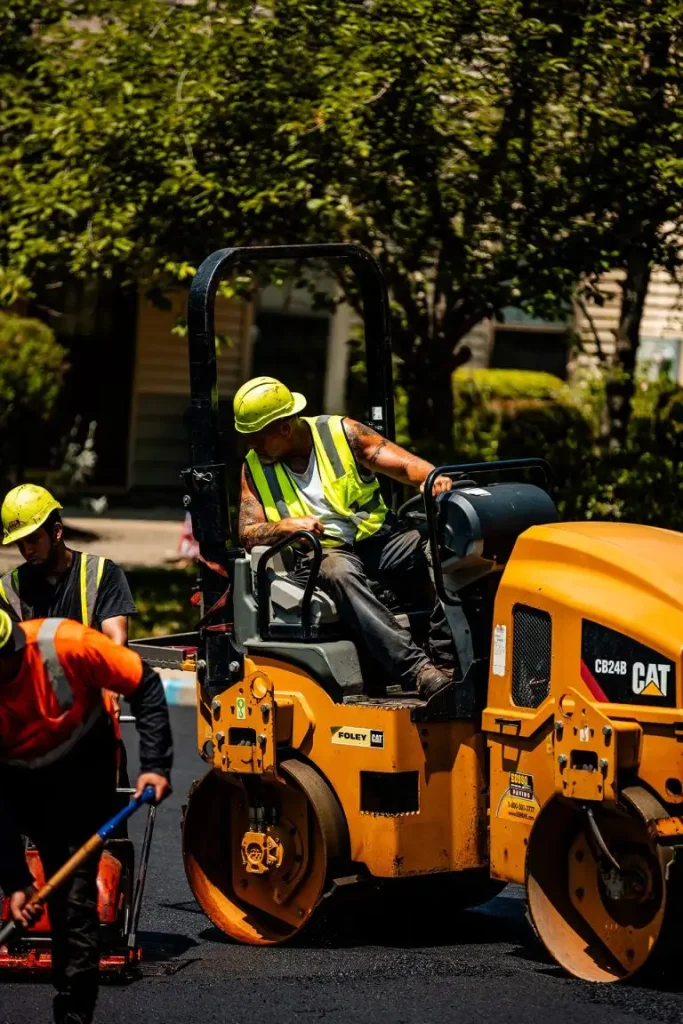 Eosso Brothers employee completing asphalt milling project using a milling machine